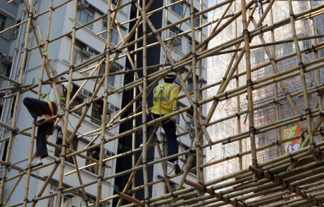Workers Working on Bamboo Scaffolding